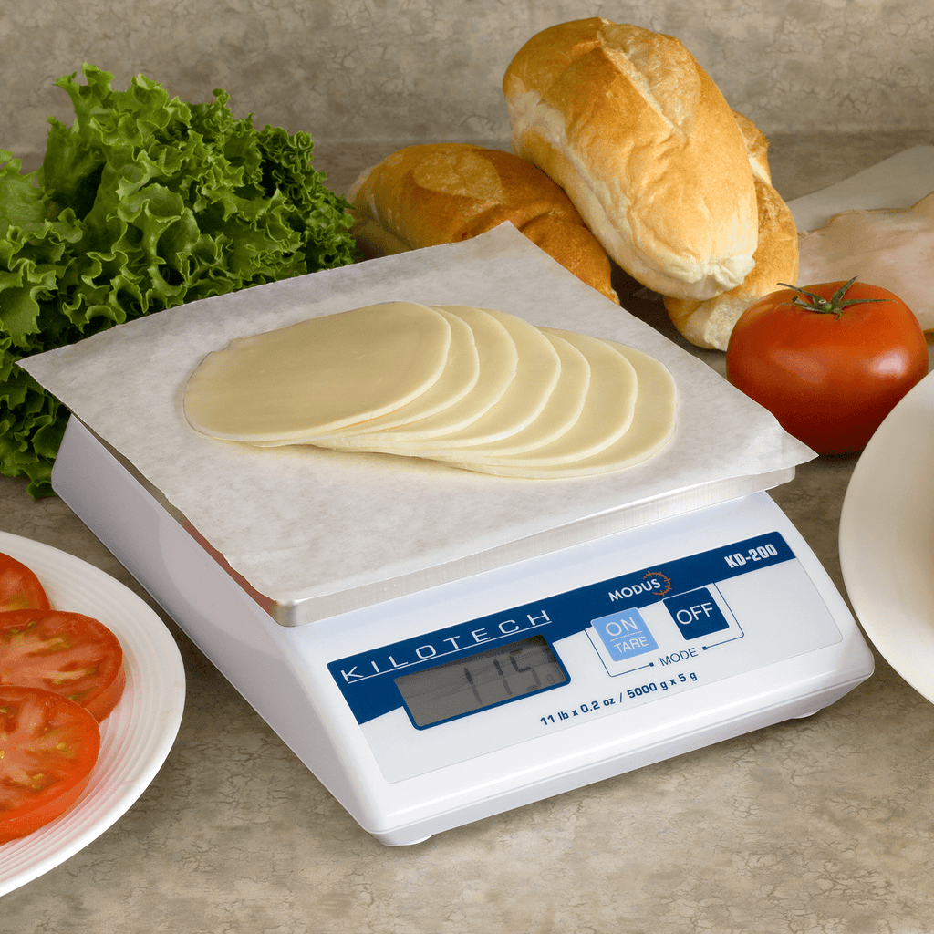 http://ifoodequipment.ca/cdn/shop/products/kilotech-kd-200-electronic-portion-scale-36680397291758_1024x1024.png?v=1644253062